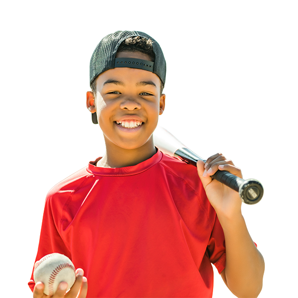 Smiling boy holding a baseball