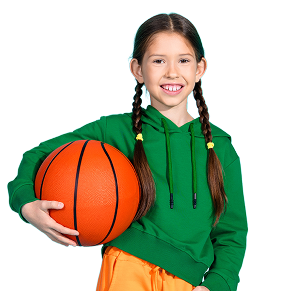 Smiling girl holding a basketball
